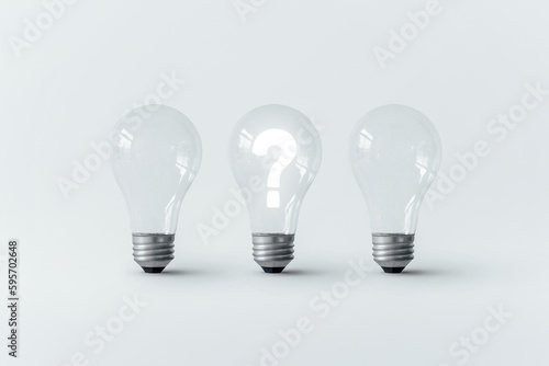 Glowing question mark inside a light bulb.