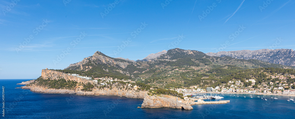 Panoramic of Puerto de Sóller (Port de Sóller), natural harbour in the Serra de Tramuntana mountain range on the island of Mallorca (Balearic Islands, Spain).