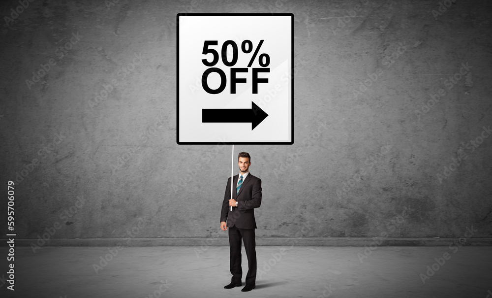 business person holding a traffic sign concept business person holding a traffic sign concept