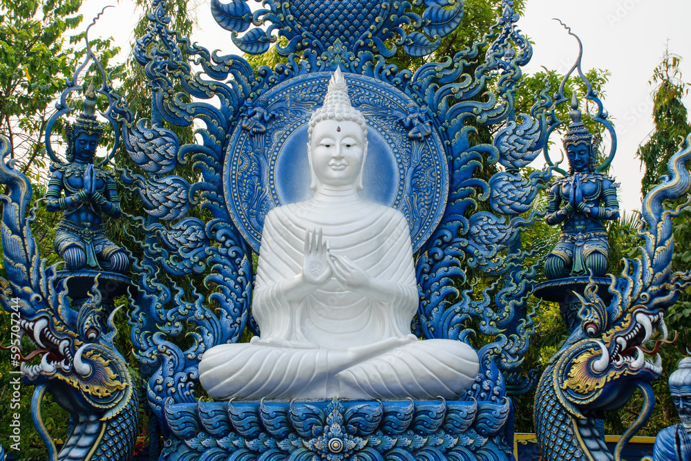 Obraz premium White buddha at blue Temple Wat Rong Suea Ten, Beautiful temple in Chiang Rai province