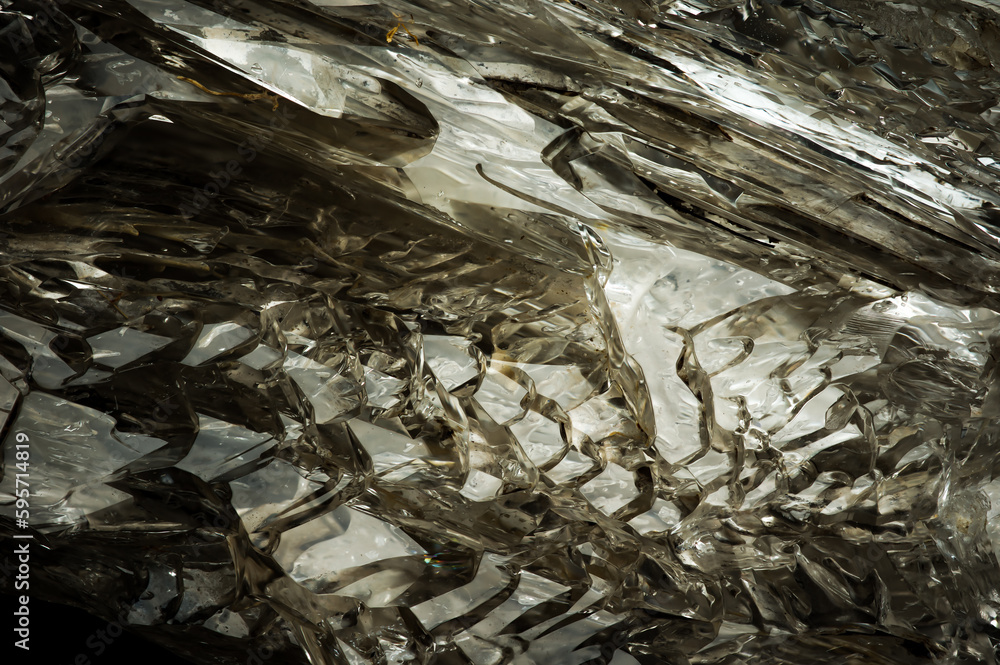 fenster elestial window quartz. macro detail texture background. close-up raw rough unpolished semi-precious gemstone fenster elestial window quartz. macro detail texture background. close-up raw rough unpolished semi-precious gemstone