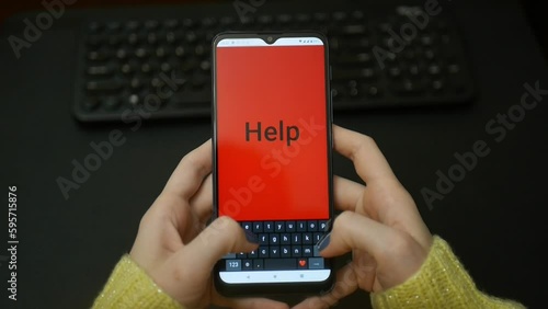 Yound woman typing word HELP on a smartphone, with an amination
