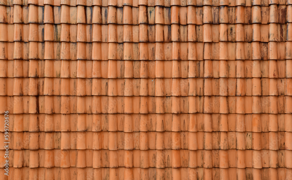 Old orange roof tiles with water stains dirt Old orange roof tiles with water stains dirt