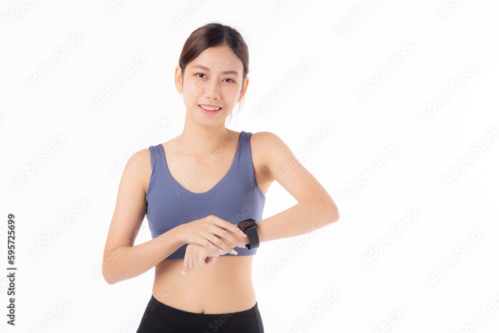 Happy young asian woman looking smartwatch for exercise and aerobics with cardio isolated on white background, female looking smart watch with wrist for pulse while workout with health, sport concept.