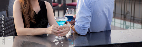 Photography Couple drinking cocktail with romance at restaurant luxury for celebrate with enjoyment together, happy man and woman dating meeting with romantic and drinking beverages, lifestyles concept
