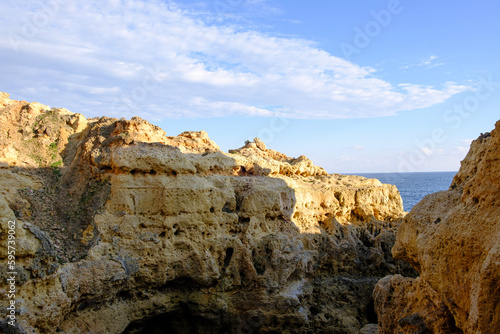 Rocky cliff formation near seaside in Algarve, Portugal
