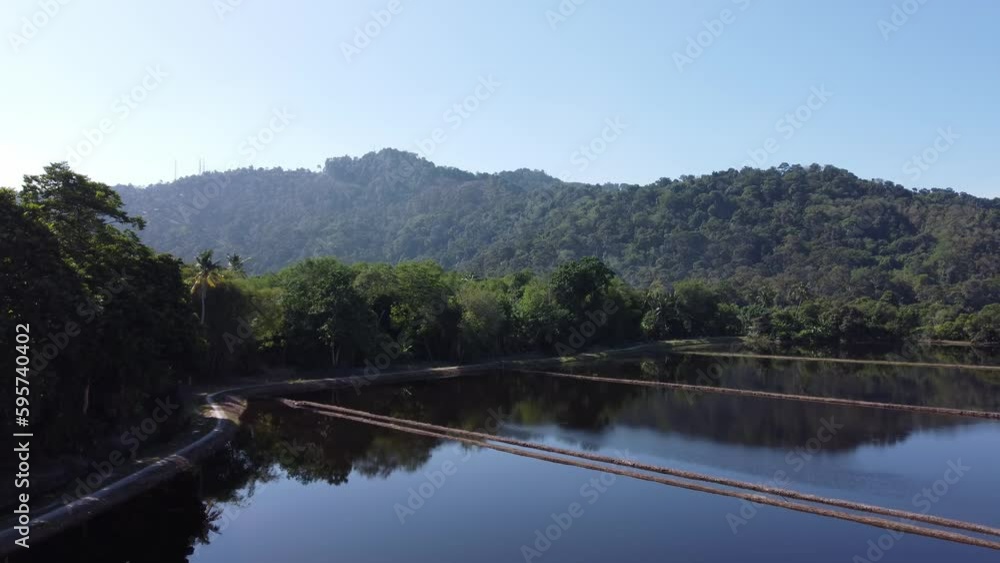 Aerial fly over beauty reflection of hill at water Aerial fly over beauty reflection of hill at water