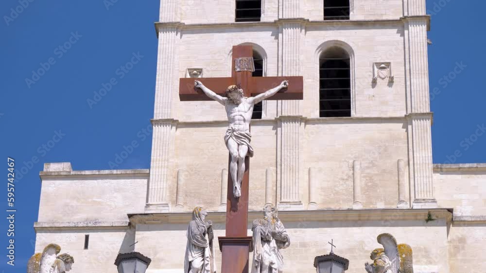 Contemplating the Sacred Image of Jesus on the Cross in Front of the ...