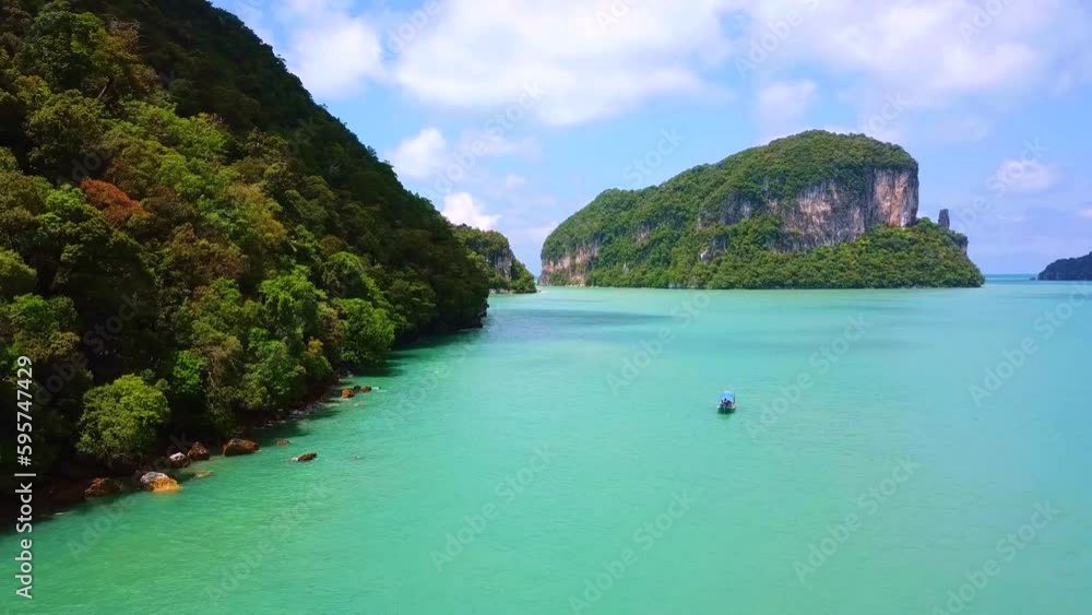 turquoise blue sea surrounded by a set of islands in a sunny day in langkawi, malaysia turquoise blue sea surrounded by a set of islands in a sunny day in langkawi, malaysia