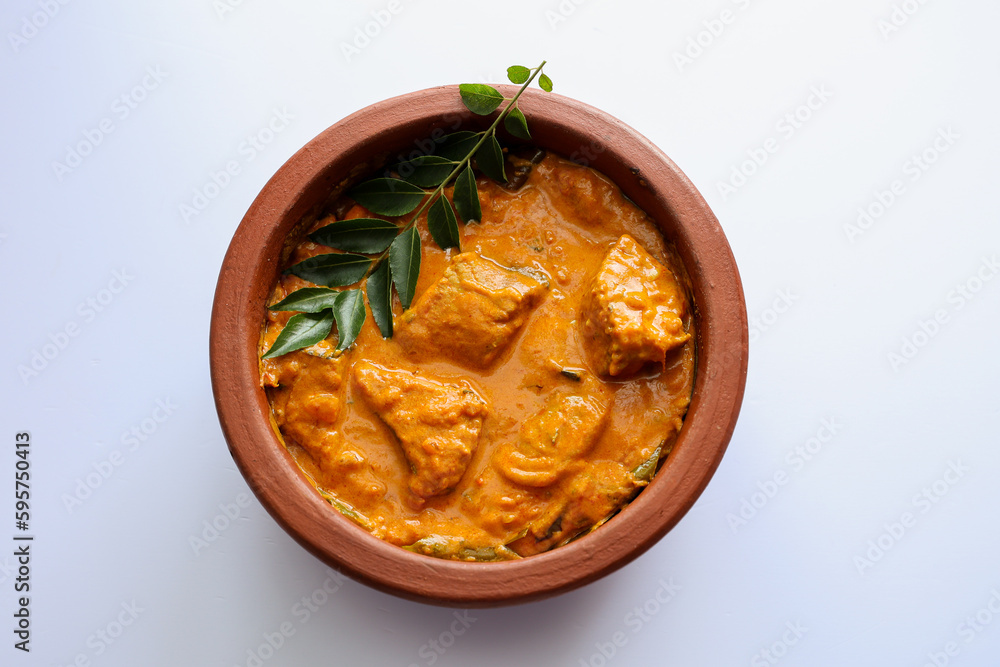 Kerala fish curry coconut milk gravy cooking spicy Goan fish curry