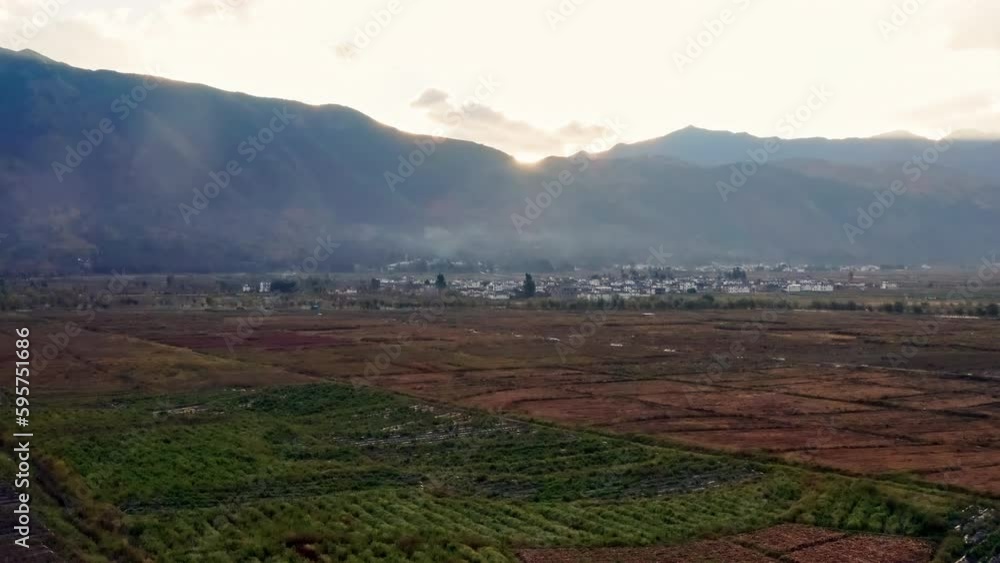 Aerial Shot of Farm Lands with Red Soil in Mountains in Yunnan, China at Sunrise Aerial Shot of Farm Lands with Red Soil in Mountains in Yunnan, China at Sunrise