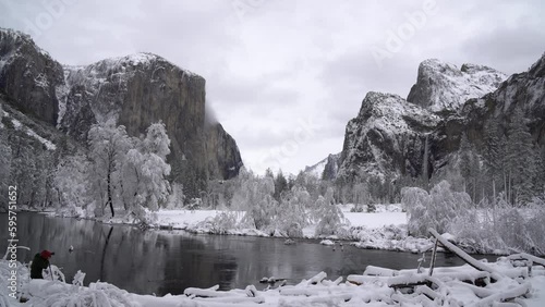 Yosemite Valley, El Capitan Covered in Snow With River in the Foreground photo
