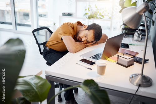 Tired business man sleeping at desk in office with burnout risk, stress problem and relax for low energy. Fatigue, lazy and depressed male employee feeling overworked, bored and bad time management