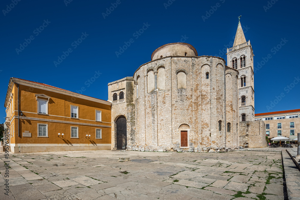 Zadar, Croatia - The Roman Forum of the old city of Zadar with the Church of St. Donatus and the bell tower of the Cathedral of St. Anastasia taken on a bright summer day with clear blue sky