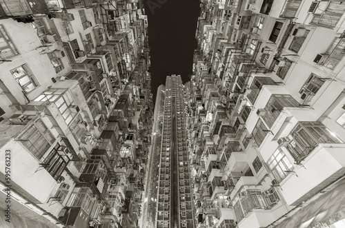 Crowded old and new residential building in Hong Kong city at night