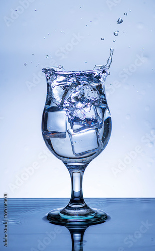 The image of pouring drinking water  into a glass 