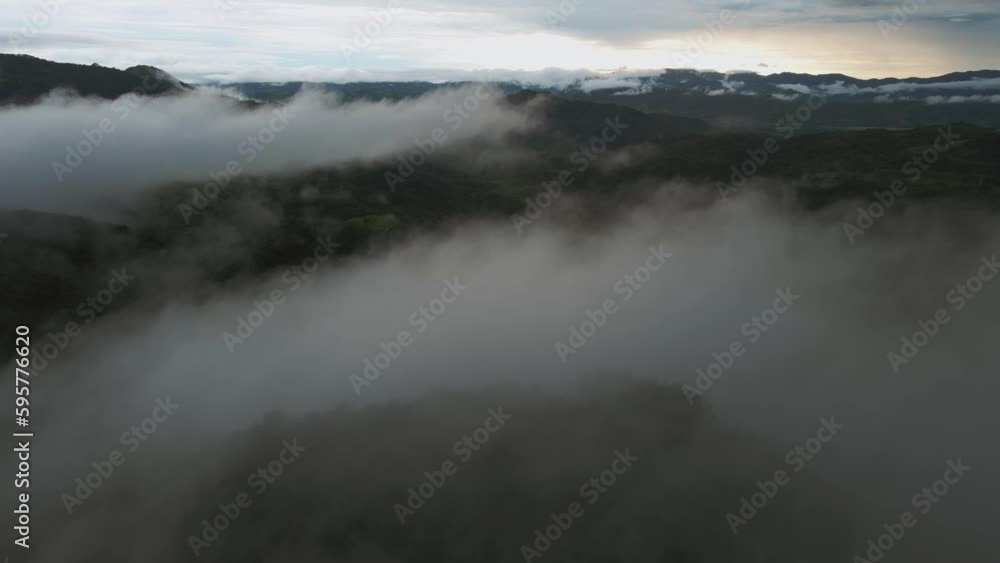 Drone Flight over the mist in the sunset time, Costa Rica Drone Flight over the mist in the sunset time, Costa Rica