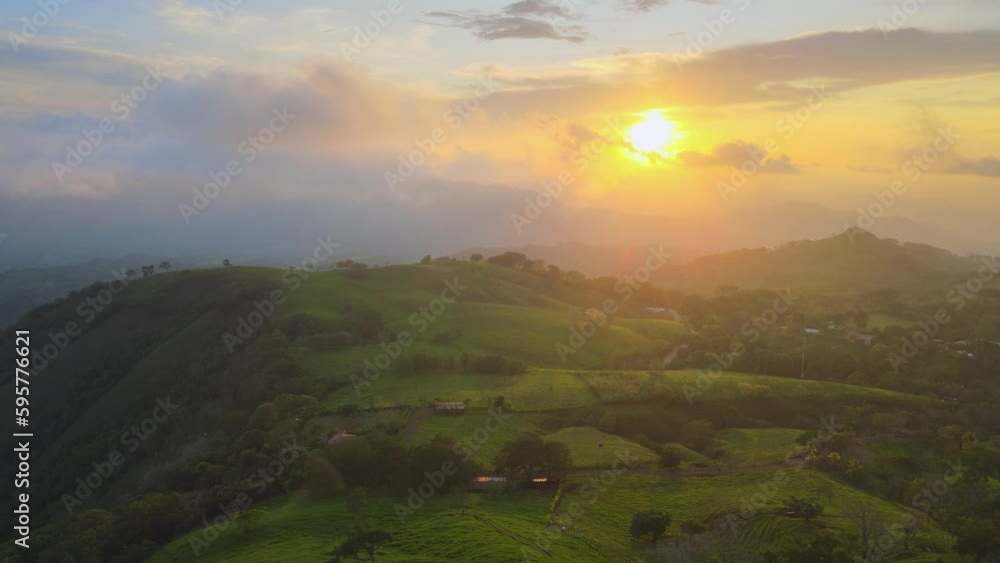 Flight over the mist in the dense tropical forests in the sunset, Costa Rica Flight over the mist in the dense tropical forests in the sunset, Costa Rica