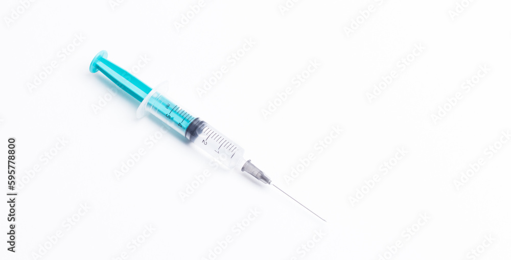 Disposable plastic syringe prepared for injection and vaccination in the hospital. The concept of medicine and health Disposable plastic syringe prepared for injection and vaccination in the hospital. The concept of medicine and health