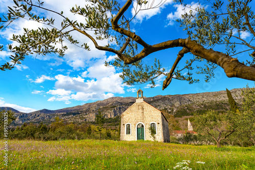 Old church of the Most Holy Trinity in village Pridvorje. Konavle region. Croatia. photo