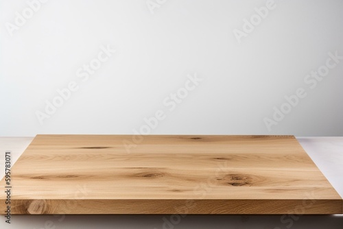 An empty wooden tabletop on a white background, perfect for product placement or montage. Generative AI © Ramin