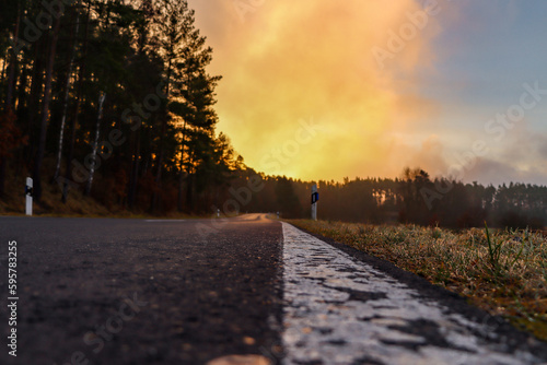 Breathtaking sunrise near forest