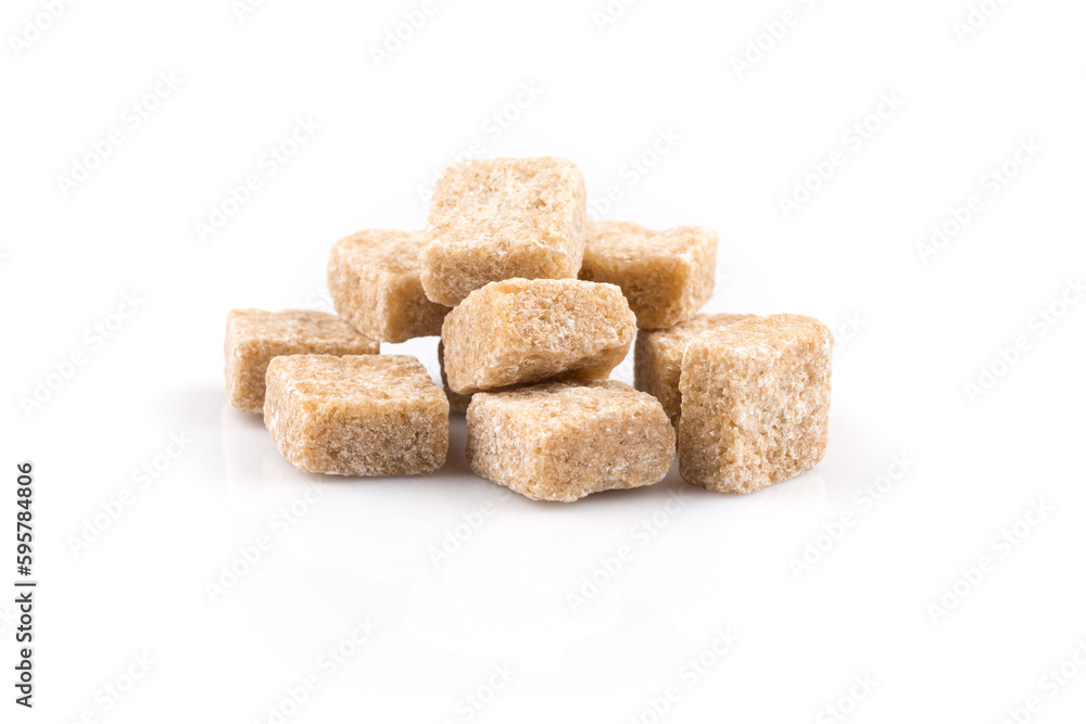 Heap brown sugar cubes isolated Heap brown sugar cubes isolated