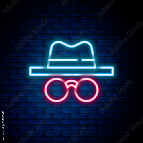 Glowing neon line Incognito mode icon isolated on brick wall background. Colorful outline concept. Vector