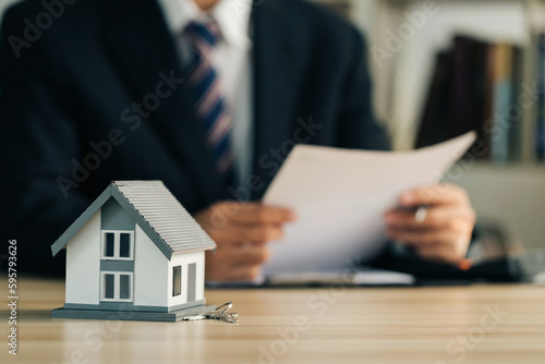 Real estate concept. businessman read the contract and detail th