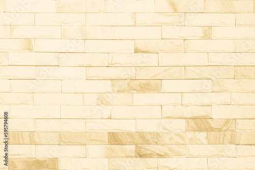 Cream and white brick wall texture background. Brickwork and stonework flooring interior rock old pattern design 