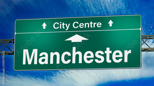 Road sign indicating direction to the city of Manchester
