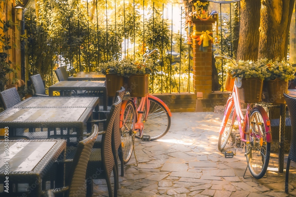 two bicycles in the courtyard of the coffee shop