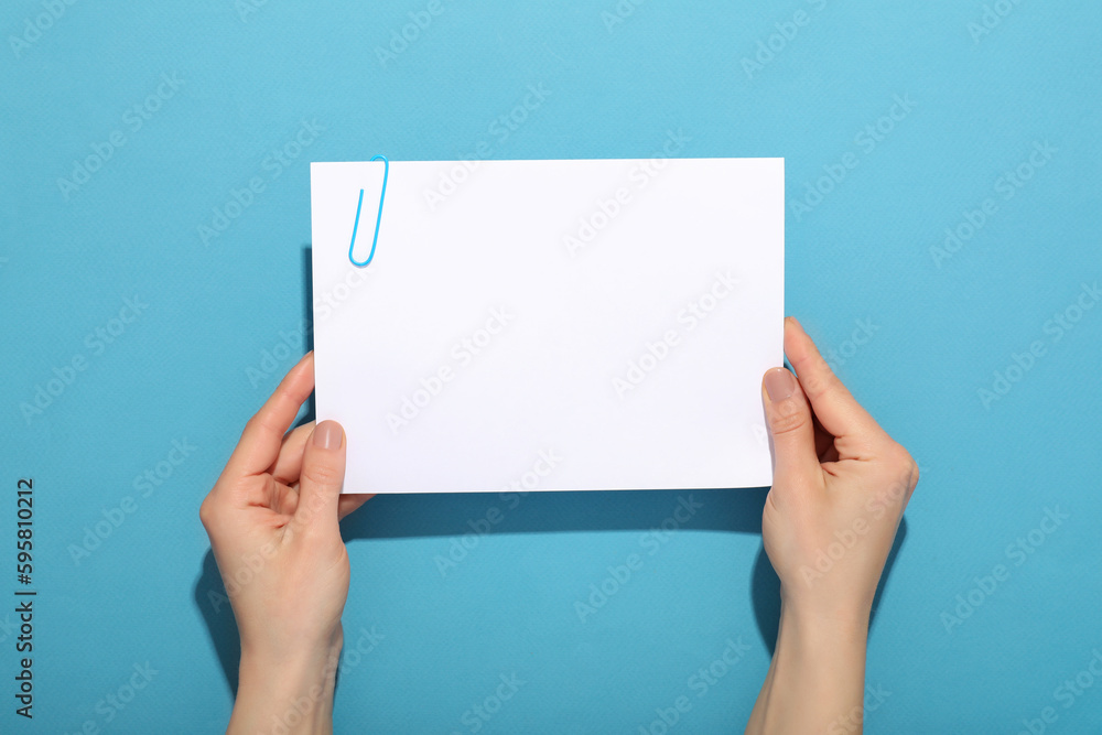 Concept of different office accessories - paper with clip Concept of different office accessories - paper with clip