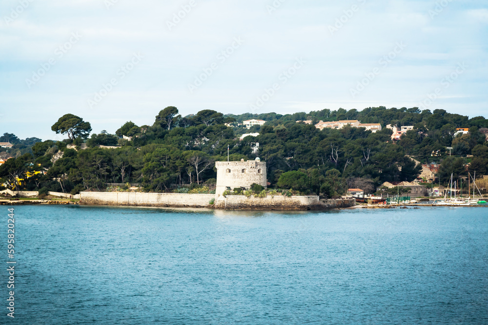 The bay of the city of Toulon in France with an old fortress on the shore of the bay.