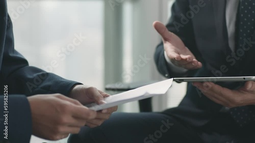 two asian corporate business men meeting in office having a discussion photo