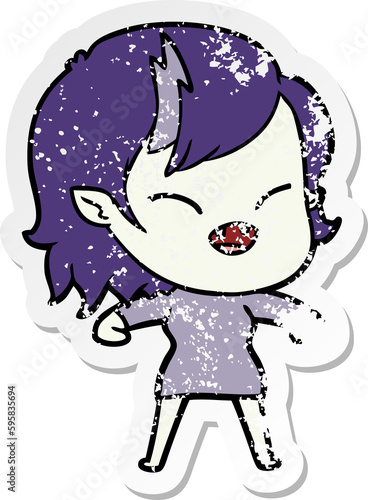 distressed sticker of a cartoon laughing vampire girl