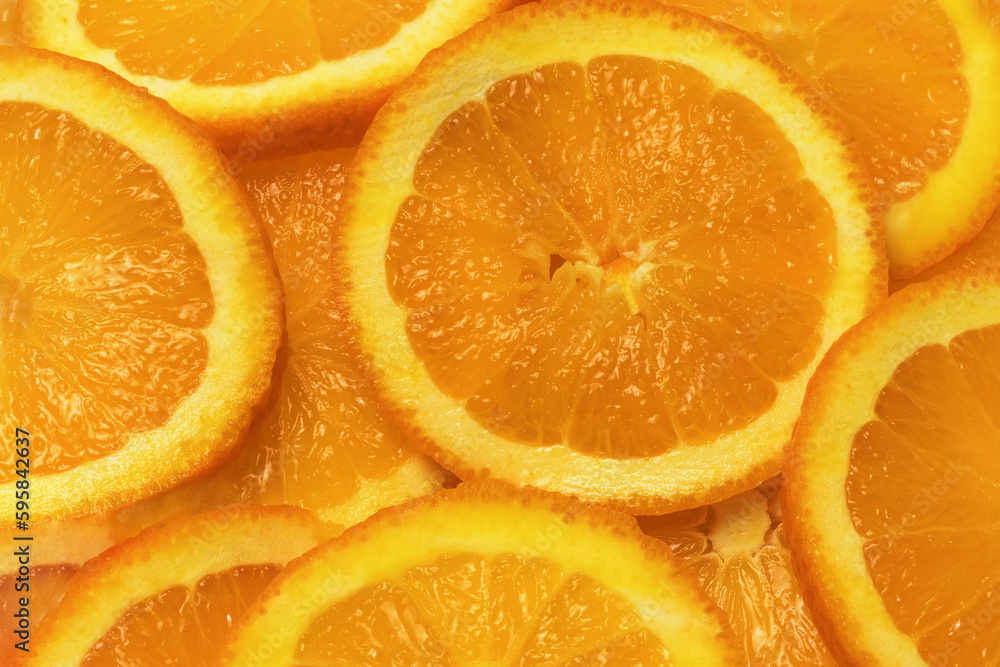 slices of oranges on a table slices of oranges on a table