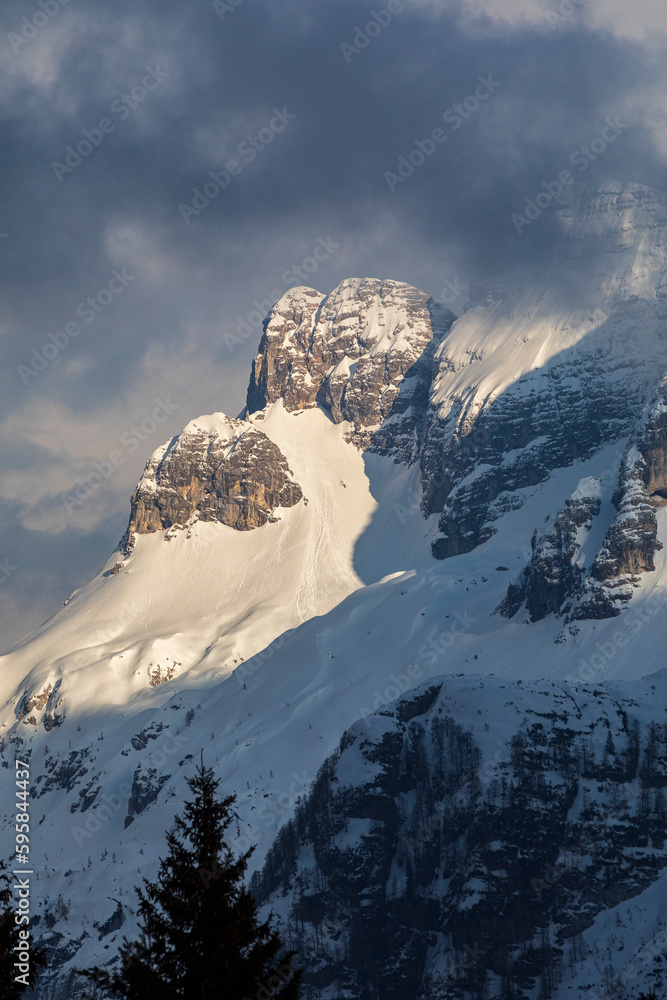 Obraz premium Spring in Sella Nevea - Friuli Venezia Giulia. A snowy sunset from The Altopiano del Montasio