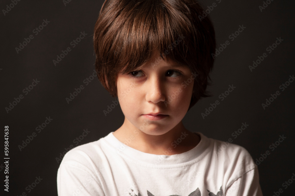 portrait of a child looking out of the corner of his eye portrait of a child looking out of the corner of his eye