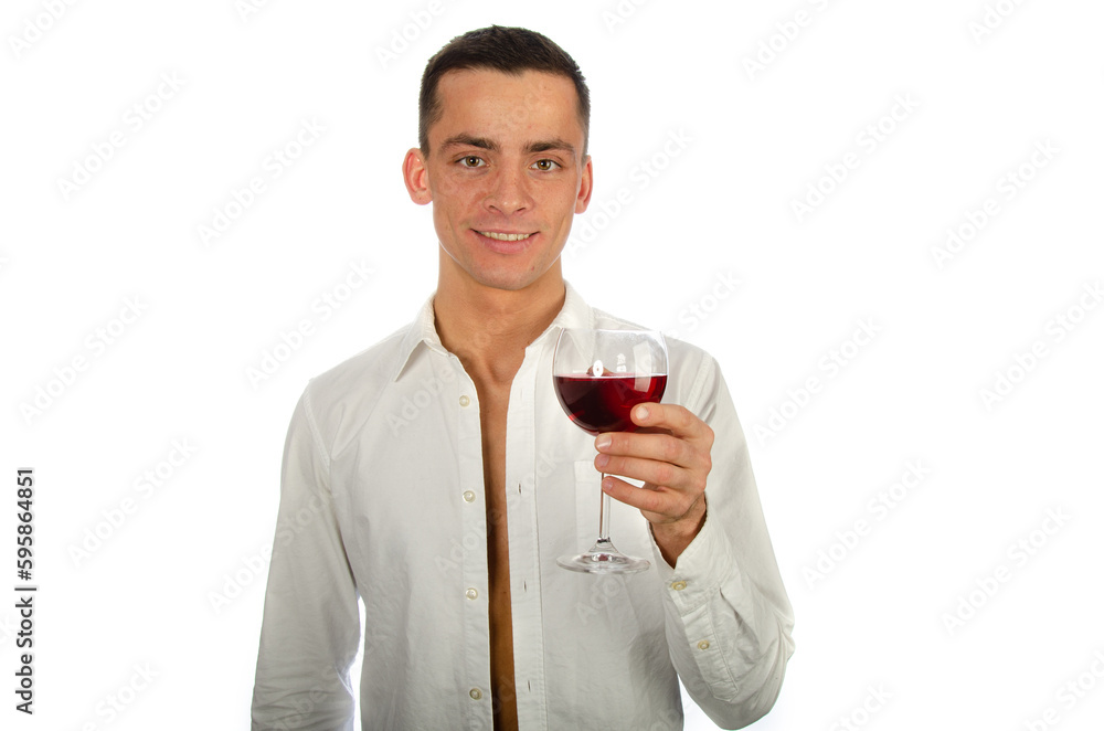 Young attractive man is drinking red wine.
Young attractive man is drinking red wine.