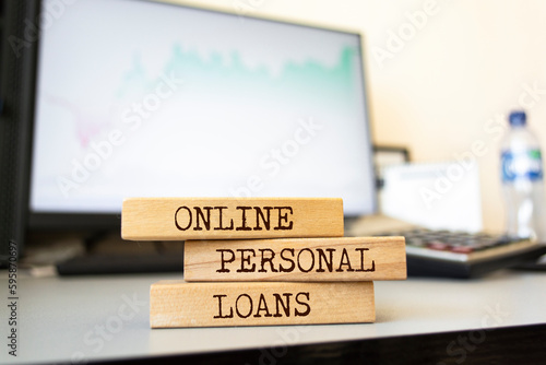Wooden blocks with words 'Online Personal Loans'. Business concept