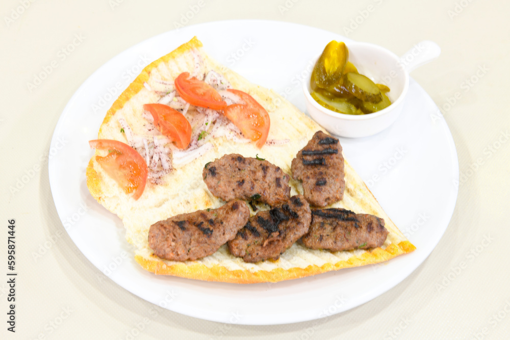 Meatball between bread (Turkish name : ekmek arasi kofte ). Izgara kofte Meatball between bread (Turkish name : ekmek arasi kofte ). Izgara kofte