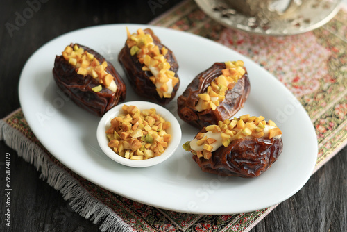 Stuffed Dates Fruit with Cream and Chopped Pistachio Nut