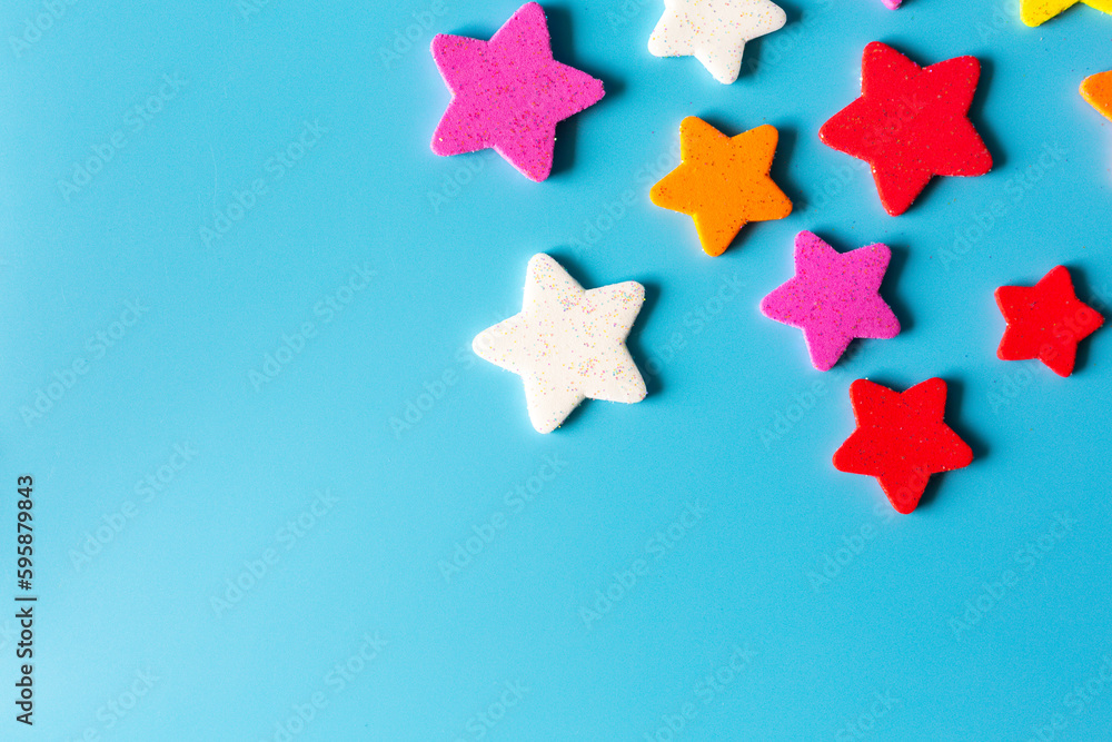 Star eva foam rubber for decoration isolated on blue background, decorative foam rubber material for creating artificial handmade star, View from above. Star eva foam rubber for decoration isolated on blue background, decorative foam rubber material for creating artificial handmade star, View from above.