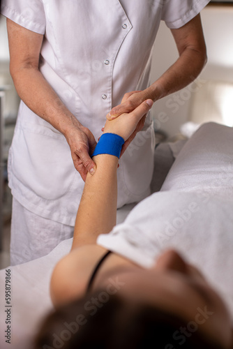 Massage procedure - neck and whole body massage by a female masseuse. doing massaging using oil. 
