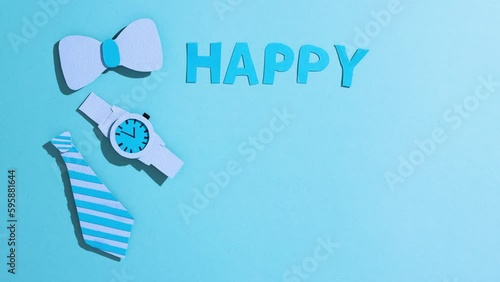 Stop motion animation with text happy father's day on blue background. Celebration, gift for dad day concept. Promotional video card. Top view, flatlay. (ID: 595881644)
