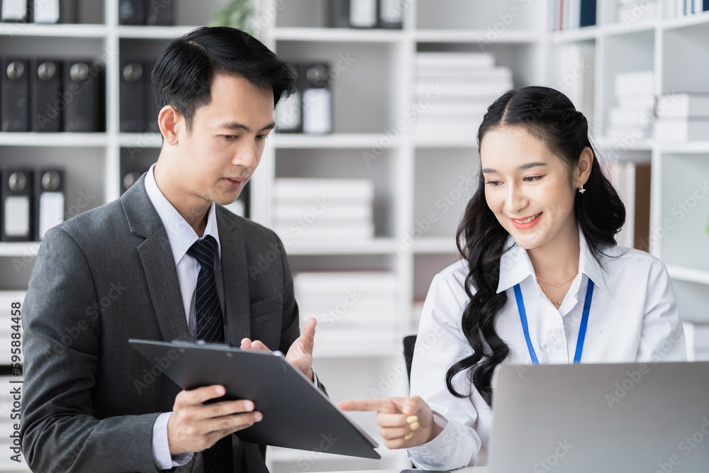 Businessmen team or financial data analysts working with tablets and laptop computers and data graphs together. Plan to analyzing projects in the office. Businessmen team or financial data analysts working with tablets and laptop computers and data graphs together. Plan to analyzing projects in the office.