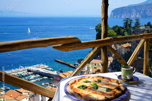 Pizza place terrace overlooking to Sorrento coast, Italy