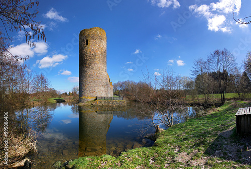 Medieval ruin of Baldenau castle with its tower and moat in early spring photo