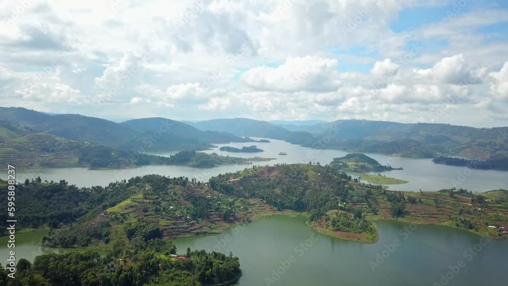 Mountain Ranges With Terraces At Lake Bunyonyi In South-Western Uganda, Kabale, Africa. Aerial Wide Shot Mountain Ranges With Terraces At Lake Bunyonyi In South-Western Uganda, Kabale, Africa. Aerial Wide Shot